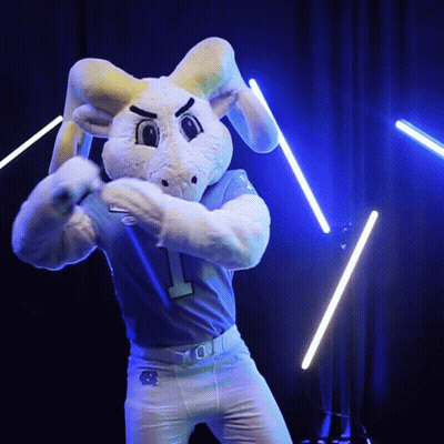 A Mascot For The University Of North Carolina Is Wearing A Blue Jersey With The Number 1 On It GIF