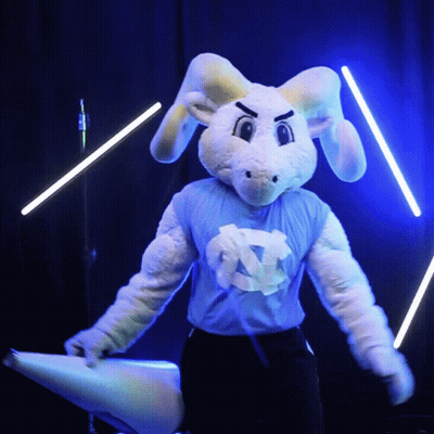 A Mascot For The University Of North Carolina Wearing A Blue Shirt With Nc On It GIF