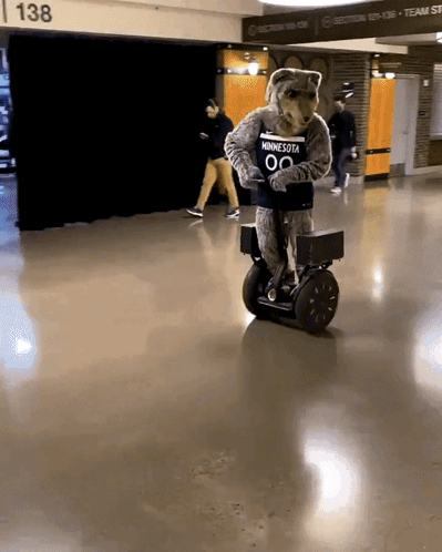 A Mascot From Minnesota Rides A Segway GIF