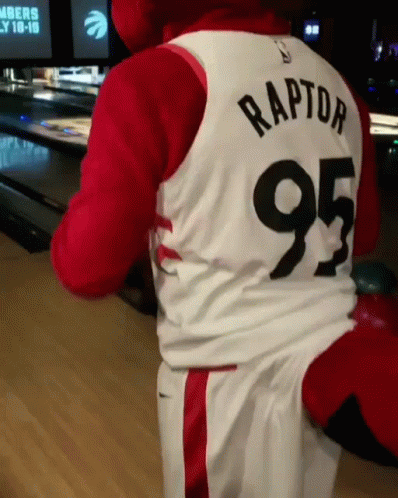 A Mascot Is Wearing A Raptors Jersey With The Number 95 On It GIF