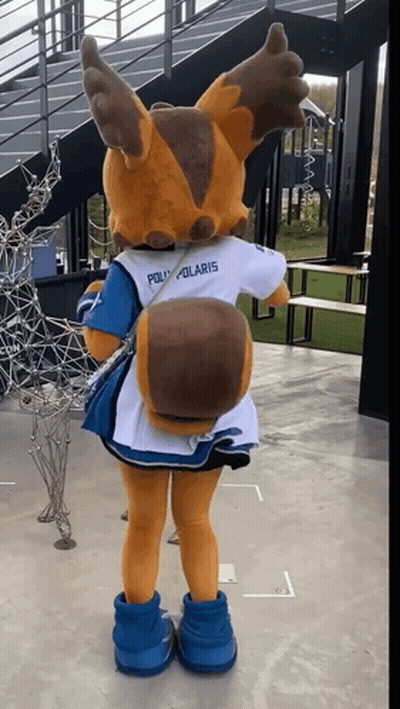 A Mascot Is Wearing A White Shirt That Says Poli Polaris GIF