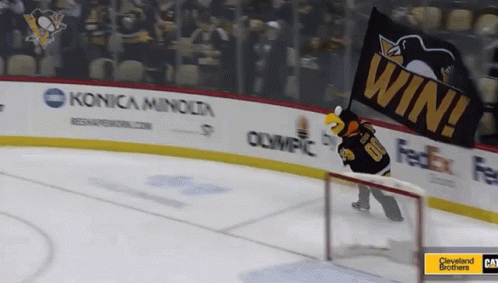 A Mascot On A Hockey Rink Holding A Win Banner GIF