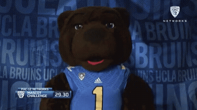 A Mascot Wearing A Blue Jersey With The Number 1 GIF