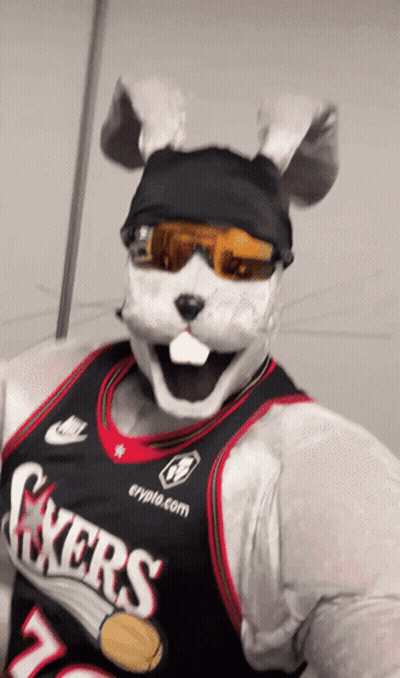 A Mascot Wearing A Jersey That Says Sixers GIF