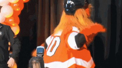 A Mascot Wearing A Jersey With The Number 10 GIF