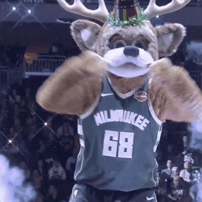 A Mascot Wearing A Milwaukee Jersey With The Number 68 GIF