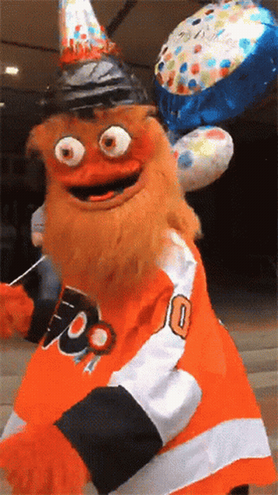 A Mascot Wearing A Number 10 Jersey Is Holding Balloons GIF