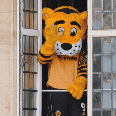 A Mascot Wearing A Shirt That Says Corendon GIF