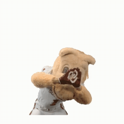 A Mascot With The Number 1 On His Jersey Is Holding A Football GIF