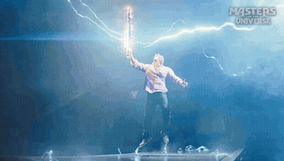 A Masters Of The Universe Poster With A Man Holding A Lightning Rod GIF