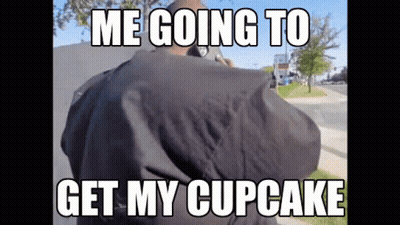 a meme of a man talking on a cell phone with the words me going to get my cupcake