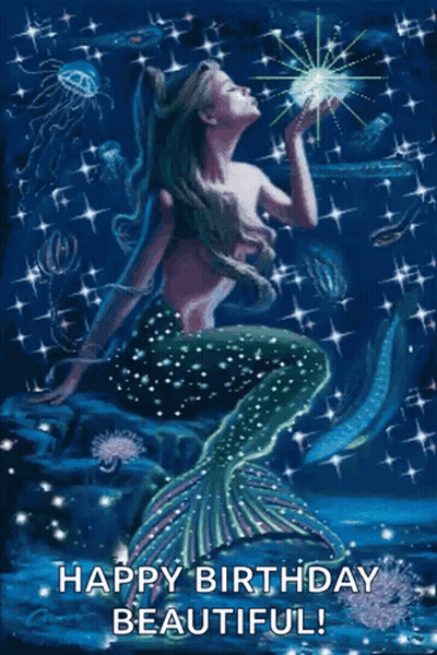 A Mermaid Is Sitting On A Rock In The Ocean And Holding A Star . GIF