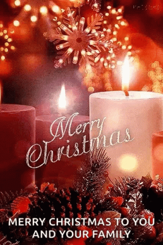 A Merry Christmas To You And Your Family Greeting Card With Two Lit Candles . GIF