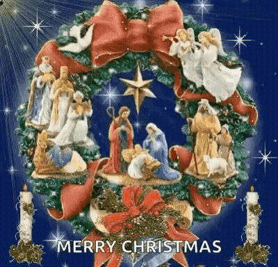 A Merry Christmas Wreath With A Nativity Scene In It GIF