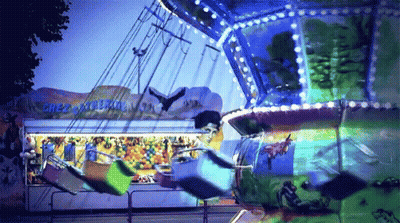 A Merry Go Round At A Carnival Has A Sign That Says " Great Escape " GIF