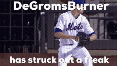 A Mets Baseball Player Is Getting Ready To Pitch The Ball GIF