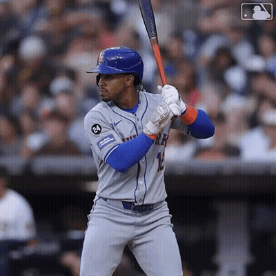 A Mets Baseball Player Is Getting Ready To Swing His Bat GIF