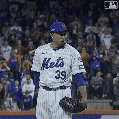 A Mets Pitcher Wearing Number 39 Stands On The Field GIF