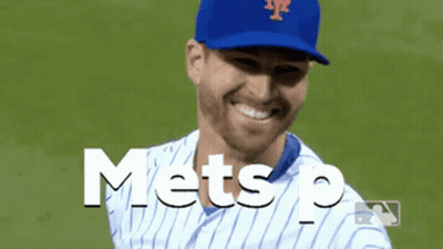 A Mets Player Is Smiling And Wearing A Blue Cap GIF