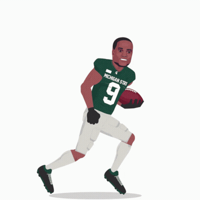 A Michigan State Football Player Running With A Football GIF
