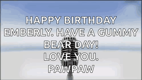 A Microphone With The Words Happy Birthday Emberly Have A Gummy Bear Day Love You Pawpaw Written On It GIF