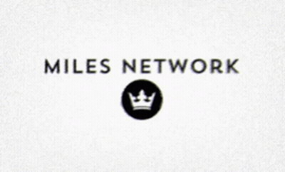 A Miles Network Logo With A Crown In A Circle GIF