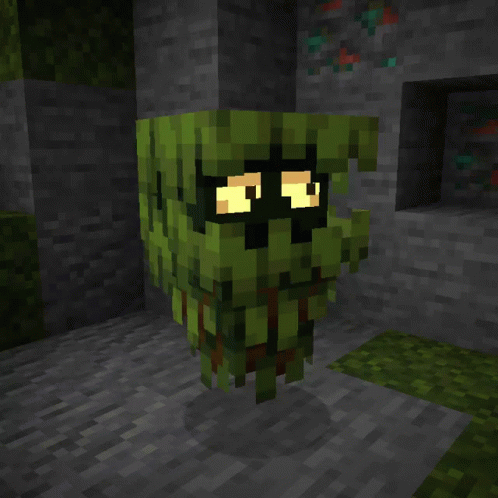 A Minecraft Character With Glowing Eyes Is Standing In Front Of A Stone Wall GIF