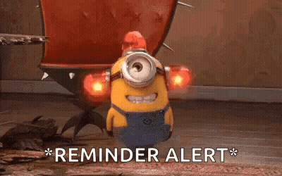 A Minion From The Movie Despicable Me Is Standing On A Wooden Floor With A Red Light On Its Head . GIF