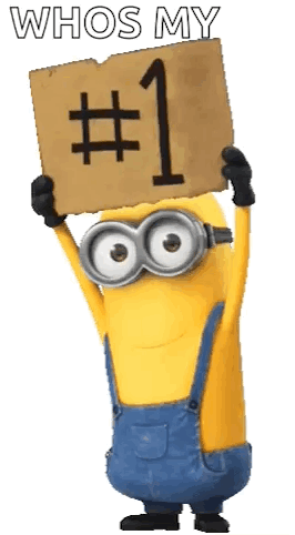 A Minion Is Holding A Sign That Says `` Whos My # 1 '' . GIF