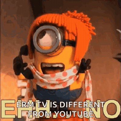 A Minion Is Talking On A Cell Phone With A Scarf Around His Neck . GIF