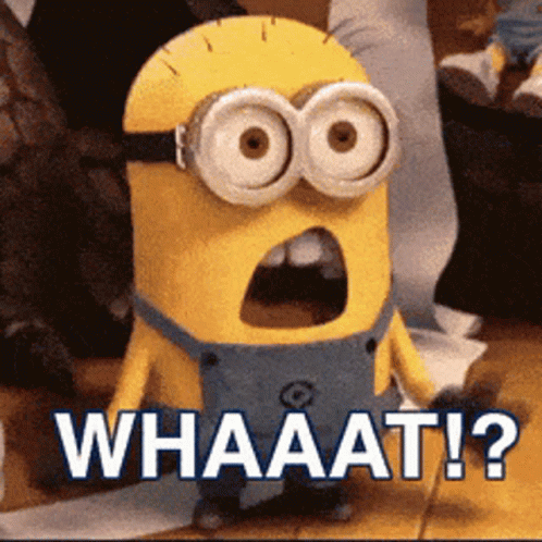A Minion With A Surprised Look On His Face And The Words Whaaat Written Below Him GIF