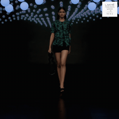 A Model Walks Down A Runway At Lakme Fashion Week GIF