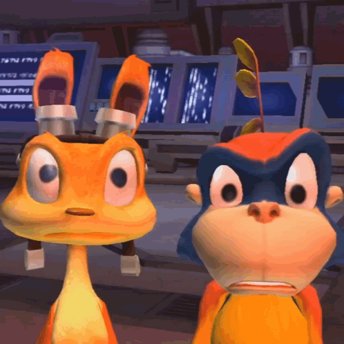 A Monkey And A Kangaroo Are Looking At Each Other GIF