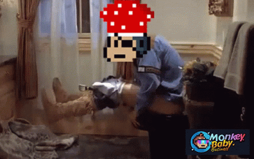 A Monkey Baby Business Advertisement With A Pixelated Image Of A Man GIF