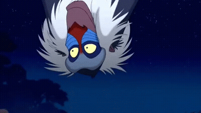 A Monkey From The Lion King Is Flying Upside Down In The Air . GIF