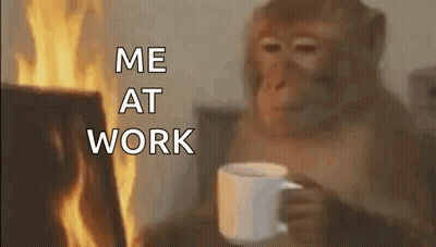 A Monkey Is Holding A Cup Of Coffee And Sitting In Front Of A Fire . GIF