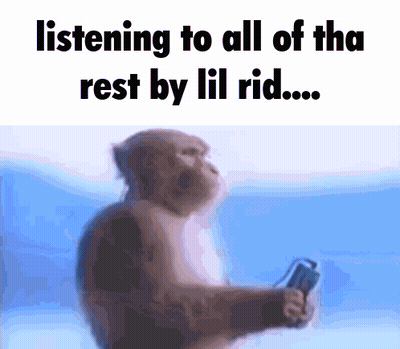 A Monkey Is Holding A Remote Control And Listening To All Of The Rest By Lil Rid GIF