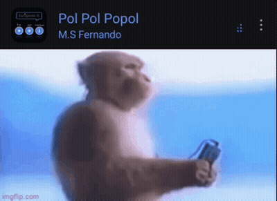 A Monkey Is Holding A Remote Control In Front Of A Screen That Says Pol Pol Popol On It GIF