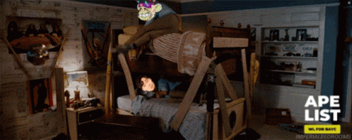 A Monkey Laying On Top Of A Bunk Bed With The Words Ape List On The Bottom Right GIF