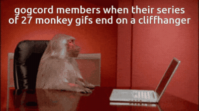 A Monkey Sits At A Desk In Front Of A Laptop With A Red Background GIF