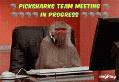 A Monkey Wearing A Headset Sits At A Desk In Front Of A Computer With The Words Picksharks Team Meeting In Progress Abov GIF