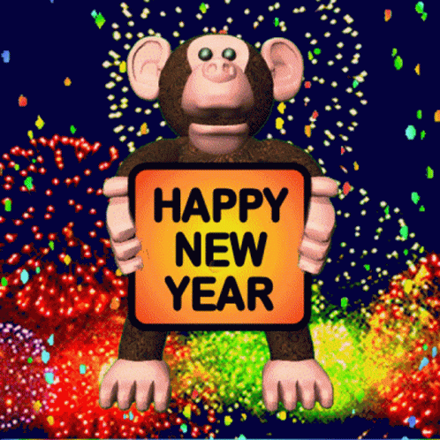 A Monkey With A Sign That Says Happy New Year GIF