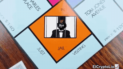 A Monopoly Board With A Picture Of A Man In Jail On It GIF