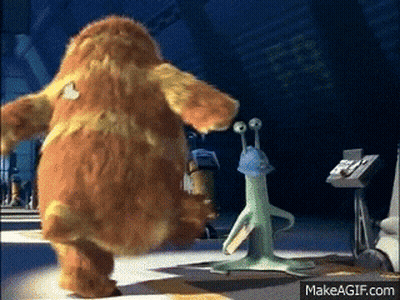 A Monster From The Movie Monsters Inc Is Standing Next To A Green Alien GIF