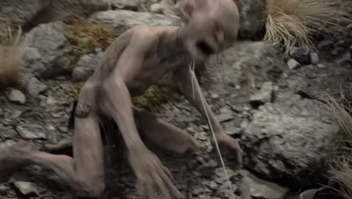 A Monster Is Crawling On The Ground With A Rope Coming Out Of His Mouth GIF