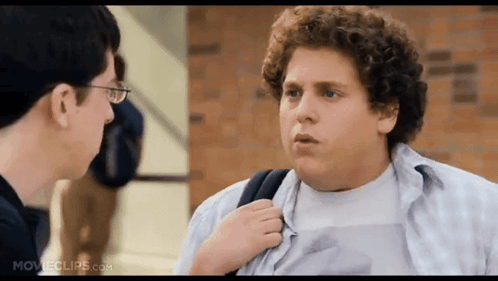 A Movie Clip From Movieclips.com Shows A Young Man Talking To Another Man GIF