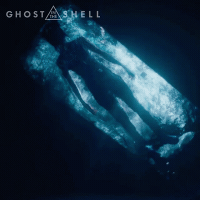 A Movie Poster For Ghost In The Shell Shows A Person Floating In The Water GIF