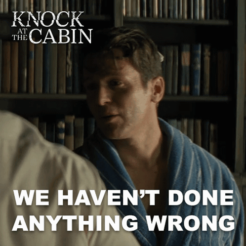 A Movie Poster For Knock At The Cabin Shows A Man In A Robe GIF