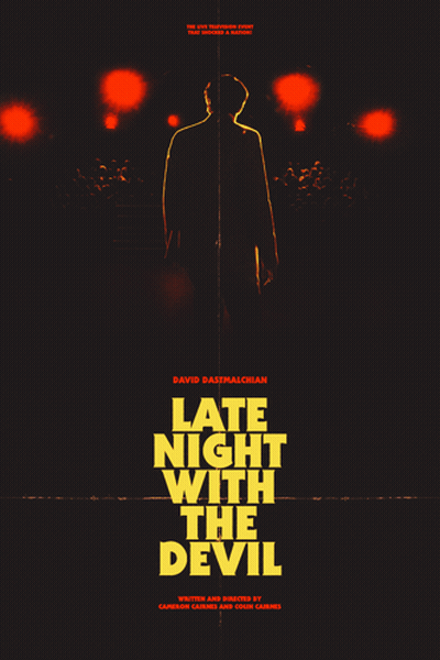 A Movie Poster For Late Night With The Devil Shows A Man Standing In The Dark GIF