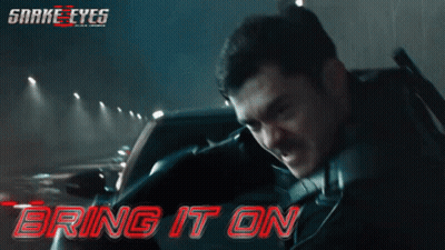 A Movie Poster For Snake Eyes Shows A Man In A Car GIF